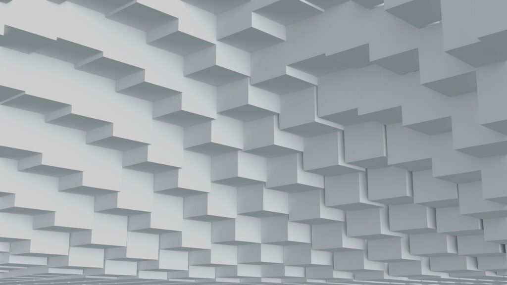 Intricate 3D white geometric architecture pattern with cubes and shadows.